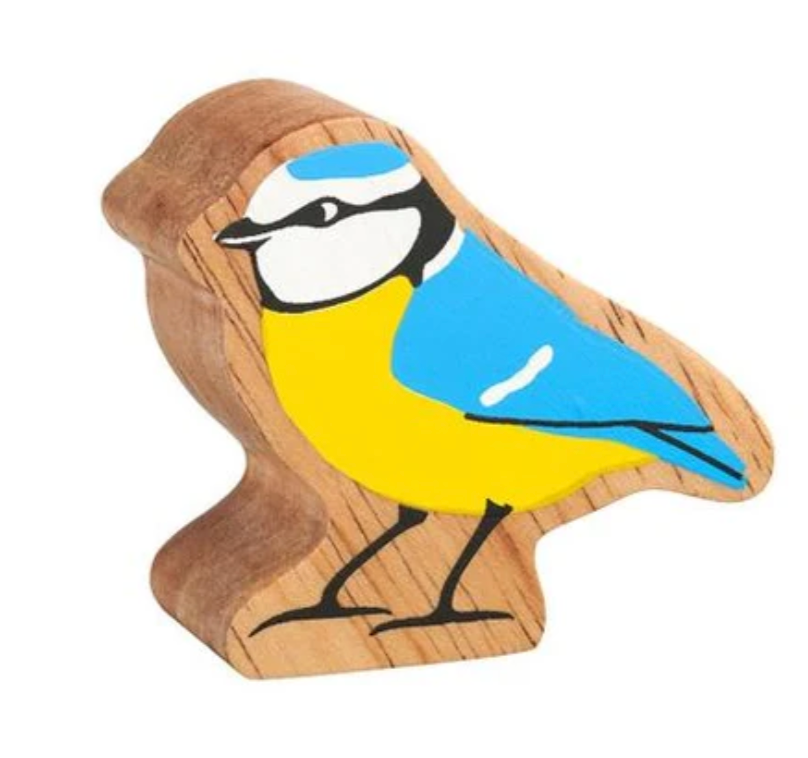 Wooden bird figurine with blue and yellow colors on a white background