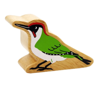 Wooden bird figurine with green body and black accents on a white background