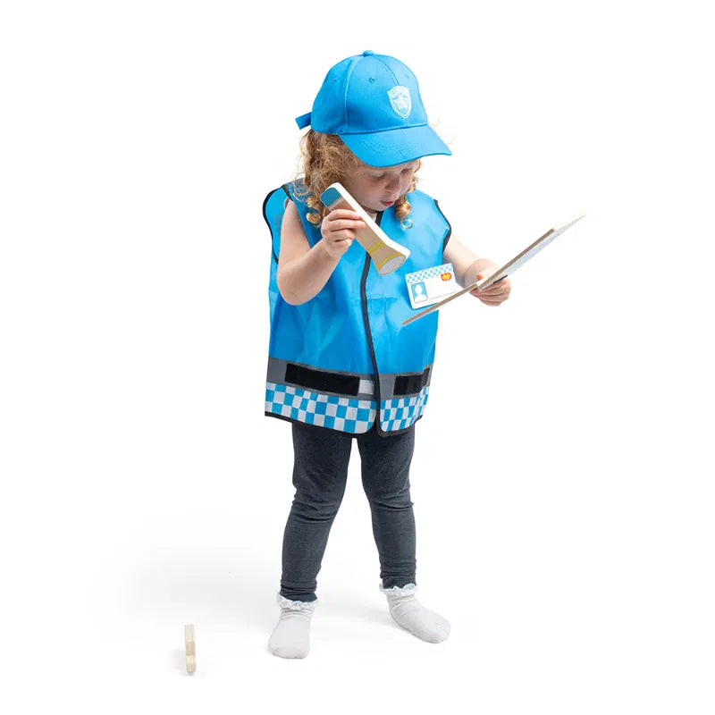 Child wearing a blue police costume with a vest, cap, and accessories on a white background