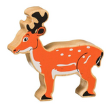 Wooden deer figure with orange body, black antlers, and white spots on a white background