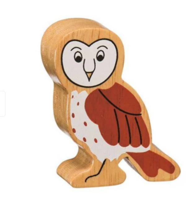 Wooden owl figurine on a white background