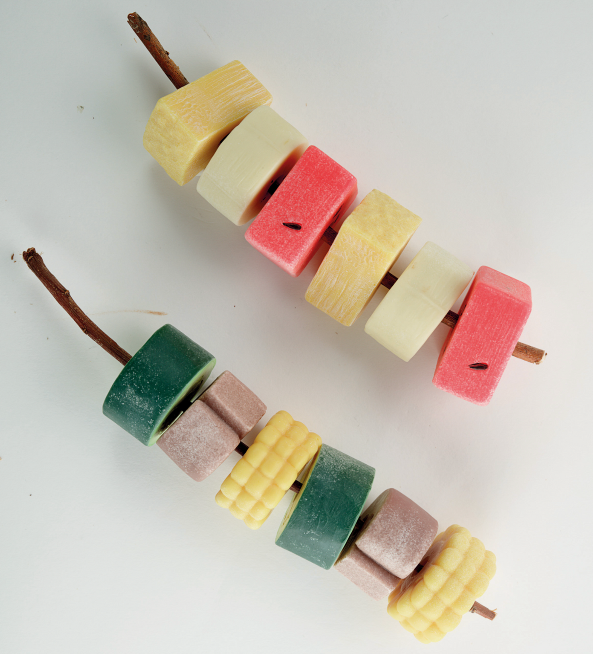 Yellow Door Sensory Play Stones – Threading Kebabs on a twig